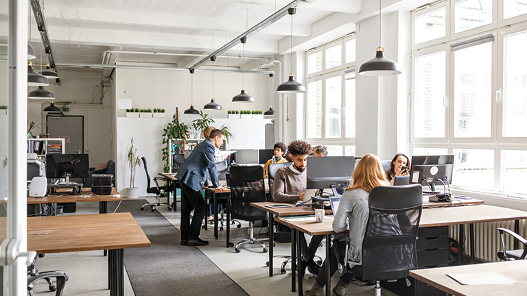 The Prepr team collaborating in a bright, modern workspace